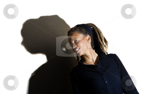 To use this stock image in your creative project, please select the size you need over to the right and click the "Add to Cart" button.
Your downloaded image will come with the Cutcaster watermark removed so don’t worry about the watermark you see on this page. Pretty African American Woman stock photo, African American woman with dreadlocks against a white wall by Scott Griessel