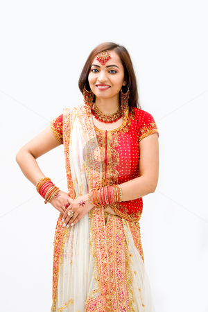 To use this stock image in your creative project, please select the size you need over to the right and click the "Add to Cart" button.
Your downloaded image will come with the Cutcaster watermark removed so don’t worry about the watermark you see on this page. Beautiful Bengali bride stock photo, Beautiful Bengali bride in colorful dress, isolated by Paul Hakimata