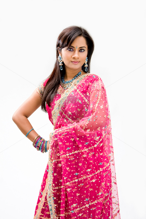 To use this stock image in your creative project, please select the size you need over to the right and click the "Add to Cart" button.
Your downloaded image will come with the Cutcaster watermark removed so don’t worry about the watermark you see on this page. Beautiful Bengali bride stock photo, Beautiful Bengali bride in colorful dress, isolated by Paul Hakimata
