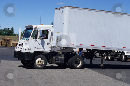 To use this stock image in your creative project, please select the size you need over to the right and click the "Add to Cart" button.
Your downloaded image will come with the Cutcaster watermark removed so don’t worry about the watermark you see on this page. Warehouse Trailer Spotter stock photo, Grocery warehouse trailer spotter by Mallorey Orcutt