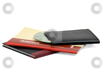 To use this stock image in your creative project, please select the size you need over to the right and click the "Add to Cart" button.
Your downloaded image will come with the Cutcaster watermark removed so don’t worry about the watermark you see on this page. Notebooks stock photo, Assorted notebooks with a cd flat piled on white background by Francesco Perre