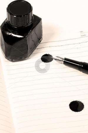 To use this stock image in your creative project, please select the size you need over to the right and click the "Add to Cart" button.
Your downloaded image will come with the Cutcaster watermark removed so don’t worry about the watermark you see on this page. Fountain pen and notebook stock photo, Classic black fountain pen on open notebook with ink bottle with stain on page,sepia filter by Francesco Perre