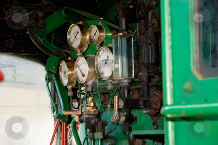 To use this stock image in your creative project, please select the size you need over to the right and click the "Add to Cart" button.
Your downloaded image will come with the Cutcaster watermark removed so don’t worry about the watermark you see on this page. Train Cabin stock photo, Dials and gauges in a train cabin by Nicholas Rjabow