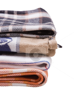 To use this stock image in your creative project, please select the size you need over to the right and click the "Add to Cart" button.
Your downloaded image will come with the Cutcaster watermark removed so don’t worry about the watermark you see on this page. Tea Towels stock photo, A stack of tea towels on a white background by Nicholas Rjabow