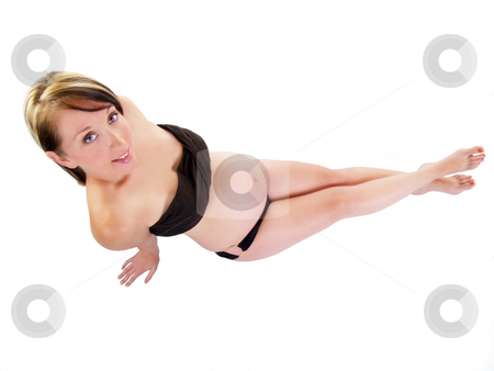 To use this stock image in your creative project, please select the size you need over to the right and click the "Add to Cart" button.
Your downloaded image will come with the Cutcaster watermark removed so don’t worry about the watermark you see on this page. Young pregnant woman from above on white background stock photo, Woman with large tummy and black top and bottom by Jeff Cleveland