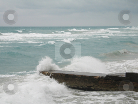 To use this stock image in your creative project, please select the size you need over to the right and click the "Add to Cart" button.
Your downloaded image will come with the Cutcaster watermark removed so don’t worry about the watermark you see on this page. Stormy tropical ocean crashing on the coast stock photo, Stormy tropical ocean crashing on the coast by Mbudley Mbudley