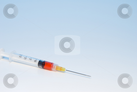 To use this stock image in your creative project, please select the size you need over to the right and click the "Add to Cart" button.
Your downloaded image will come with the Cutcaster watermark removed so don’t worry about the watermark you see on this page. Syringe stock photo, A medical syringe filled with red medication by Robert Byron