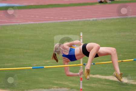 To use this stock image in your creative project, please select the size you need over to the right and click the "Add to Cart" button.
Your downloaded image will come with the Cutcaster watermark removed so don’t worry about the watermark you see on this page. Pole Vaulter stock photo, Pole Vaulter clearing the bar by Nicholas Rjabow