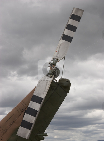 To use this stock image in your creative project, please select the size you need over to the right and click the "Add to Cart" button.
Your downloaded image will come with the Cutcaster watermark removed so don’t worry about the watermark you see on this page. Rotor stock photo, Helicopter Rotor Blade against a cloudy sky by Nicholas Rjabow