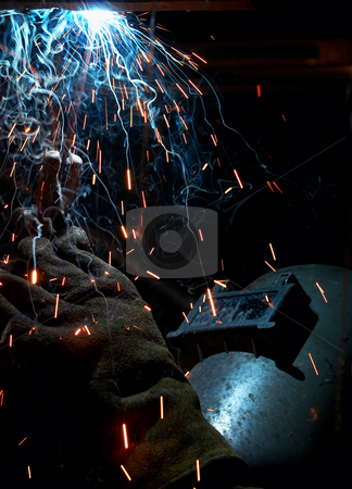 To use this stock image in your creative project, please select the size you need over to the right and click the "Add to Cart" button.
Your downloaded image will come with the Cutcaster watermark removed so don’t worry about the watermark you see on this page. Welding color stock photo, A picture of a welder working at night by Glen Jones