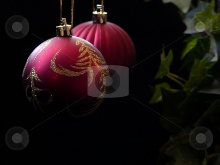 To use this stock image in your creative project, please select the size you need over to the right and click the "Add to Cart" button.
Your downloaded image will come with the Cutcaster watermark removed so don’t worry about the watermark you see on this page. Red Christmas Ornaments with Ivy stock photo, by Corinna Walby