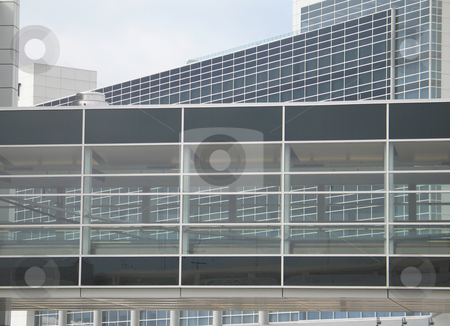 To use this stock image in your creative project, please select the size you need over to the right and click the "Add to Cart" button.
Your downloaded image will come with the Cutcaster watermark removed so don’t worry about the watermark you see on this page. Glass modern building stock photo, Glass modern building by Mbudley Mbudley