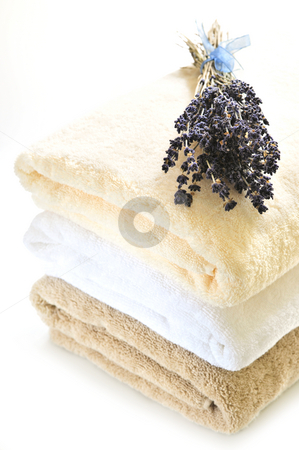 To use this stock image in your creative project, please select the size you need over to the right and click the "Add to Cart" button.
Your downloaded image will come with the Cutcaster watermark removed so don’t worry about the watermark you see on this page. Stack of towels stock photo, Stack of soft towels isolated on white background by Elena Elisseeva