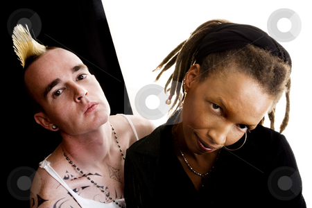 To use this stock image in your creative project, please select the size you need over to the right and click the "Add to Cart" button.
Your downloaded image will come with the Cutcaster watermark removed so don’t worry about the watermark you see on this page. White Man and Black Woman stock photo, Portrait of white man with mohawk and black woman with dreadlocks by Scott Griessel