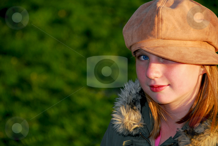 To use this stock image in your creative project, please select the size you need over to the right and click the "Add to Cart" button.
Your downloaded image will come with the Cutcaster watermark removed so don’t worry about the watermark you see on this page. Girl portrait outside stock photo, Portriat of a young smiling girl in fall clothes outside by Elena Elisseeva