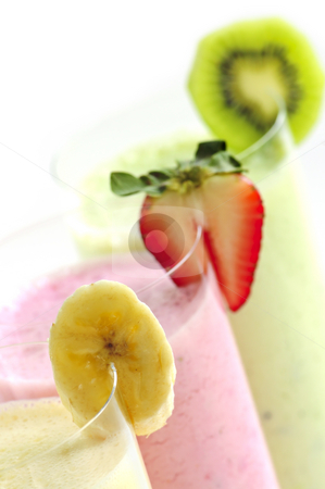 To use this stock image in your creative project, please select the size you need over to the right and click the "Add to Cart" button.
Your downloaded image will come with the Cutcaster watermark removed so don’t worry about the watermark you see on this page. Assorted fruit smoothies stock photo, Assorted fruit smoothies close up on white background by Elena Elisseeva