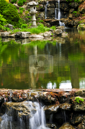To use this stock image in your creative project, please select the size you need over to the right and click the "Add to Cart" button.
Your downloaded image will come with the Cutcaster watermark removed so don’t worry about the watermark you see on this page. Cascading waterfall and pond stock photo, Cascading waterfall and pond in japanese garden by Elena Elisseeva
