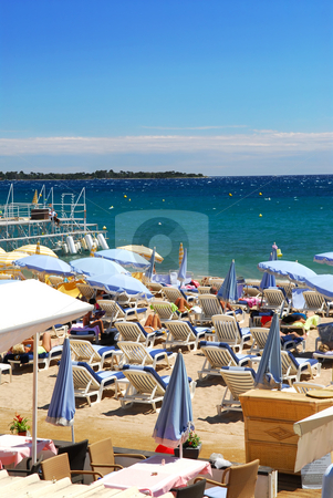 To use this stock image in your creative project, please select the size you need over to the right and click the "Add to Cart" button.
Your downloaded image will come with the Cutcaster watermark removed so don’t worry about the watermark you see on this page. Beach in Cannes, France stock photo, Beach along Croisette promenade in Cannes, France by Elena Elisseeva