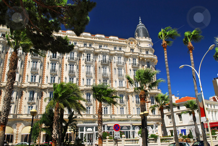 To use this stock image in your creative project, please select the size you need over to the right and click the "Add to Cart" button.
Your downloaded image will come with the Cutcaster watermark removed so don’t worry about the watermark you see on this page. Croisette promenade in Cannes stock photo, Luxury hotel on Croisette promenade in Cannes France by Elena Elisseeva