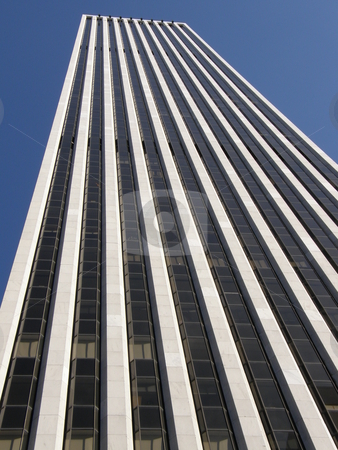 To use this stock image in your creative project, please select the size you need over to the right and click the "Add to Cart" button.
Your downloaded image will come with the Cutcaster watermark removed so don’t worry about the watermark you see on this page. Skyscraper in New York City stock photo, by Ritu Jethani