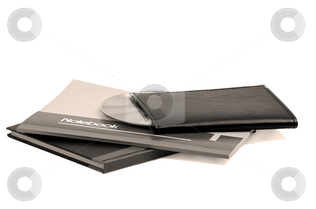To use this stock image in your creative project, please select the size you need over to the right and click the "Add to Cart" button.
Your downloaded image will come with the Cutcaster watermark removed so don’t worry about the watermark you see on this page. Notebooks stock photo, Assorted notebooks with a cd flat piled on white background,sepia filter by Francesco Perre