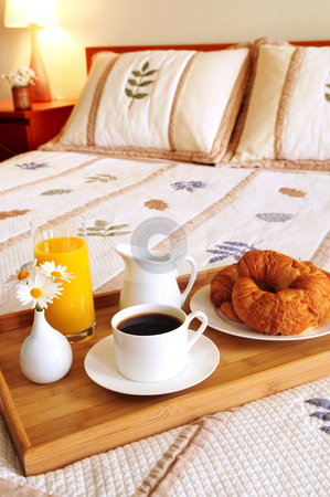 To use this stock image in your creative project, please select the size you need over to the right and click the "Add to Cart" button.
Your downloaded image will come with the Cutcaster watermark removed so don’t worry about the watermark you see on this page. Breakfast on a bed in a hotel room stock photo, Tray with breakfast on a bed in a hotel room by Elena Elisseeva
