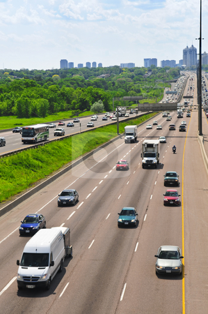 To use this stock image in your creative project, please select the size you need over to the right and click the "Add to Cart" button.
Your downloaded image will come with the Cutcaster watermark removed so don’t worry about the watermark you see on this page. Busy highway stock photo, Busy multi-lane highway in a big city by Elena Elisseeva
