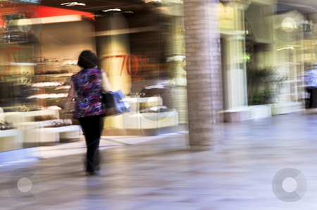 To use this stock image in your creative project, please select the size you need over to the right and click the "Add to Cart" button.
Your downloaded image will come with the Cutcaster watermark removed so don’t worry about the watermark you see on this page. Shopping in a mall stock photo, Woman shopping in a mall, panning shot, intentional in-camera motion blur by Elena Elisseeva