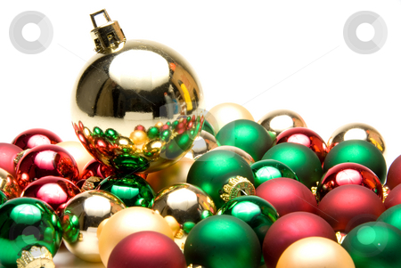 To use this stock image in your creative project, please select the size you need over to the right and click the "Add to Cart" button.
Your downloaded image will come with the Cutcaster watermark removed so don’t worry about the watermark you see on this page. Christmas Ornaments stock photo, A pile of seasonal ornaments used during the Christmas season. by Robert Byron