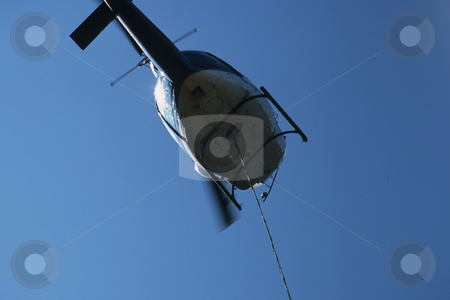 To use this stock image in your creative project, please select the size you need over to the right and click the "Add to Cart" button.
Your downloaded image will come with the Cutcaster watermark removed so don’t worry about the watermark you see on this page. Logging Helicopter stock photo, Logging Helicopter With Long Line At Landing. by Mallorey Orcutt