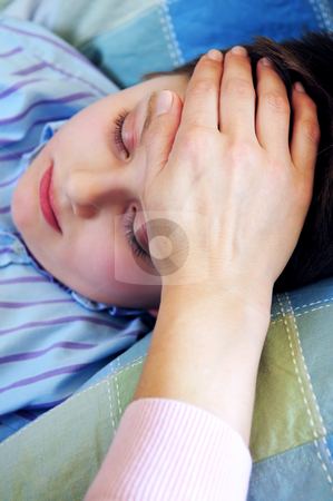 To use this stock image in your creative project, please select the size you need over to the right and click the "Add to Cart" button.
Your downloaded image will come with the Cutcaster watermark removed so don’t worry about the watermark you see on this page. Sick child stock photo, Mother's hand feeling the forehead of a sick child by Elena Elisseeva