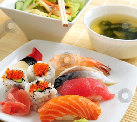 To use this stock image in your creative project, please select the size you need over to the right and click the "Add to Cart" button.
Your downloaded image will come with the Cutcaster watermark removed so don’t worry about the watermark you see on this page. Sushi lunch stock photo, Sushi lunch with miso soup and green salad by Elena Elisseeva