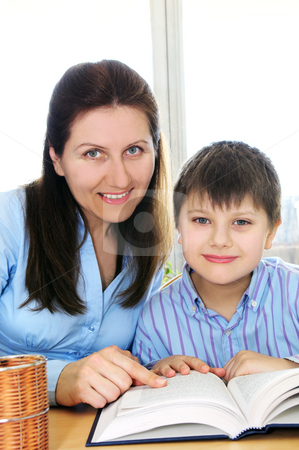 To use this stock image in your creative project, please select the size you need over to the right and click the "Add to Cart" button.
Your downloaded image will come with the Cutcaster watermark removed so don’t worry about the watermark you see on this page. Tutoring stock photo, Teacher or tutor helping school boy to study by Elena Elisseeva