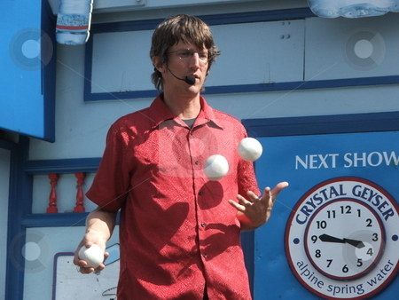 To use this stock image in your creative project, please select the size you need over to the right and click the "Add to Cart" button.
Your downloaded image will come with the Cutcaster watermark removed so don’t worry about the watermark you see on this page. Boardwalk juggler stock photo, A juggler entertains in a free show on a Fisherman's Wharf open air stage in San Francisco. Fisherman's Wharf is rated the top tourist attraction in San Franciso. by Dennis Thomsen