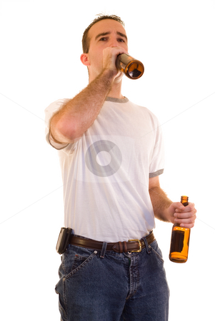 To use this stock image in your creative project, please select the size you need over to the right and click the "Add to Cart" button.
Your downloaded image will come with the Cutcaster watermark removed so don’t worry about the watermark you see on this page. Man Drinking Beer stock photo, A young man drinking some beer, isolated against a white background by Richard Nelson
