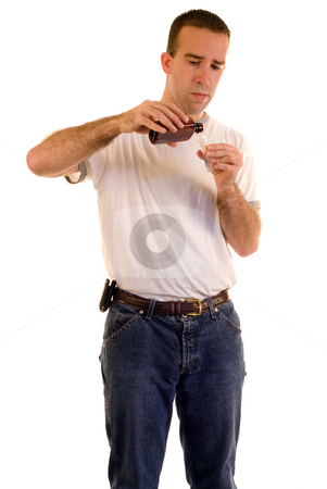 To use this stock image in your creative project, please select the size you need over to the right and click the "Add to Cart" button.
Your downloaded image will come with the Cutcaster watermark removed so don’t worry about the watermark you see on this page. Measuring Cough Medicine stock photo, A man measuring some cough medicine, isolated against a white background by Richard Nelson