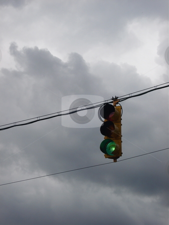 To use this stock image in your creative project, please select the size you need over to the right and click the "Add to Cart" button.
Your downloaded image will come with the Cutcaster watermark removed so don’t worry about the watermark you see on this page. Stop Light Against Cloudy Colorado Sky stock photo, A stop light swings in front of a cloudy Colorado Sky. by Ben O'Neal