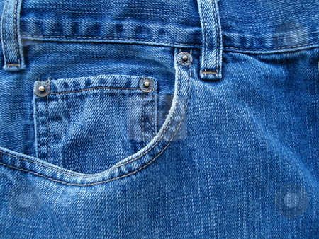 To use this stock image in your creative project, please select the size you need over to the right and click the "Add to Cart" button.
Your downloaded image will come with the Cutcaster watermark removed so don’t worry about the watermark you see on this page. Blue Jean Pockets stock photo, A pair of blue jeans reveals details in the evening sunlight from a nearby window. by Ben O'Neal