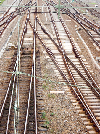 To use this stock image in your creative project, please select the size you need over to the right and click the "Add to Cart" button.
Your downloaded image will come with the Cutcaster watermark removed so don’t worry about the watermark you see on this page. Railway tracks stock photo, A lot of railway tracks coming together by Karin Claus