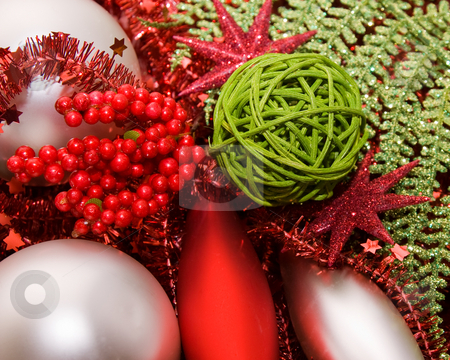 To use this stock image in your creative project, please select the size you need over to the right and click the "Add to Cart" button.
Your downloaded image will come with the Cutcaster watermark removed so don’t worry about the watermark you see on this page. Xmas decoration ornaments stock photo, Xmas decoration ornaments in silver and green and red by Karin Claus