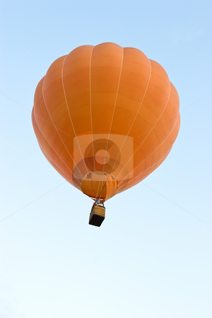 To use this stock image in your creative project, please select the size you need over to the right and click the "Add to Cart" button.
Your downloaded image will come with the Cutcaster watermark removed so don’t worry about the watermark you see on this page. Balloon stock photo, A hot air balloon up in the air against a blue sky by Nicholas Rjabow
