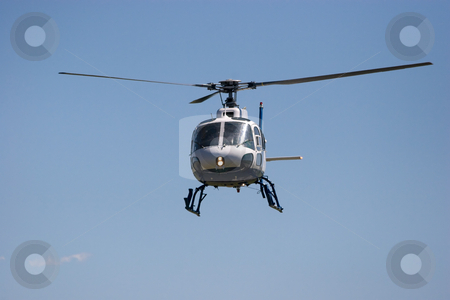 To use this stock image in your creative project, please select the size you need over to the right and click the "Add to Cart" button.
Your downloaded image will come with the Cutcaster watermark removed so don’t worry about the watermark you see on this page. Helicopter stock photo, Helicopter in flight by Nicholas Rjabow