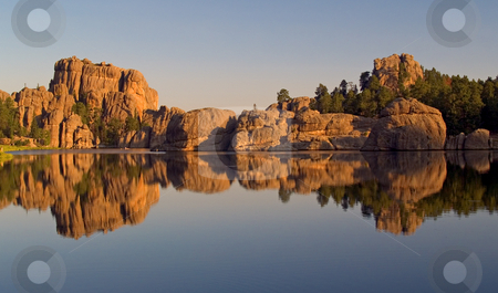 To use this stock image in your creative project, please select the size you need over to the right and click the "Add to Cart" button.
Your downloaded image will come with the Cutcaster watermark removed so don’t worry about the watermark you see on this page. Sylvan Lake Reflection stock photo, Sylvan Lake, Custer State Park. South Dakota by John McLaird