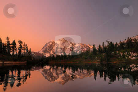 To use this stock image in your creative project, please select the size you need over to the right and click the "Add to Cart" button.
Your downloaded image will come with the Cutcaster watermark removed so don’t worry about the watermark you see on this page. Mt Shuksan with alpine glow stock photo, Mount Shuksan with the alpine glow after sunset by Nilanjan Bhattacharya