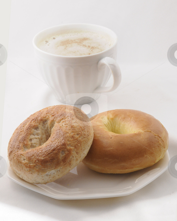 To use this stock image in your creative project, please select the size you need over to the right and click the "Add to Cart" button.
Your downloaded image will come with the Cutcaster watermark removed so don’t worry about the watermark you see on this page. Bagels in the Morning stock photo, Fresh bagels in the morning for breakfast. by Timothy OLeary