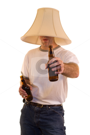 To use this stock image in your creative project, please select the size you need over to the right and click the "Add to Cart" button.
Your downloaded image will come with the Cutcaster watermark removed so don’t worry about the watermark you see on this page. Party Time stock photo, A young man wearing a lamp shade on his head offering a beer by Richard Nelson