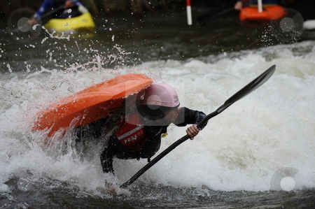 To use this stock image in your creative project, please select the size you need over to the right and click the "Add to Cart" button.
Your downloaded image will come with the Cutcaster watermark removed so don’t worry about the watermark you see on this page. Kayaker stock photo, Whitewater kayaker doing a trick by Moriya Beck
