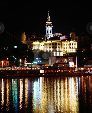 To use this stock image in your creative project, please select the size you need over to the right and click the "Add to Cart" button.
Your downloaded image will come with the Cutcaster watermark removed so don’t worry about the watermark you see on this page. Night cityscape stock photo, Night illuminated Belgrade from river with light reflection by Julija Sapic