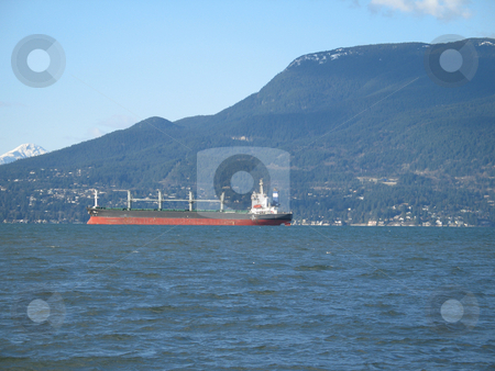 To use this stock image in your creative project, please select the size you need over to the right and click the "Add to Cart" button.
Your downloaded image will come with the Cutcaster watermark removed so don’t worry about the watermark you see on this page. Large tanker on the ocean stock photo, by Mbudley Mbudley