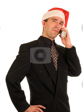To use this stock image in your creative project, please select the size you need over to the right and click the "Add to Cart" button.
Your downloaded image will come with the Cutcaster watermark removed so don’t worry about the watermark you see on this page. Christmas Conversation stock photo, A young employee having a conversation on the phone during Christmas by Richard Nelson